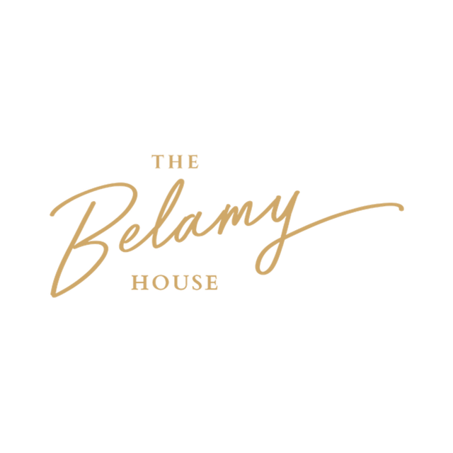 Logo for The Belamy House in gold script on white background.