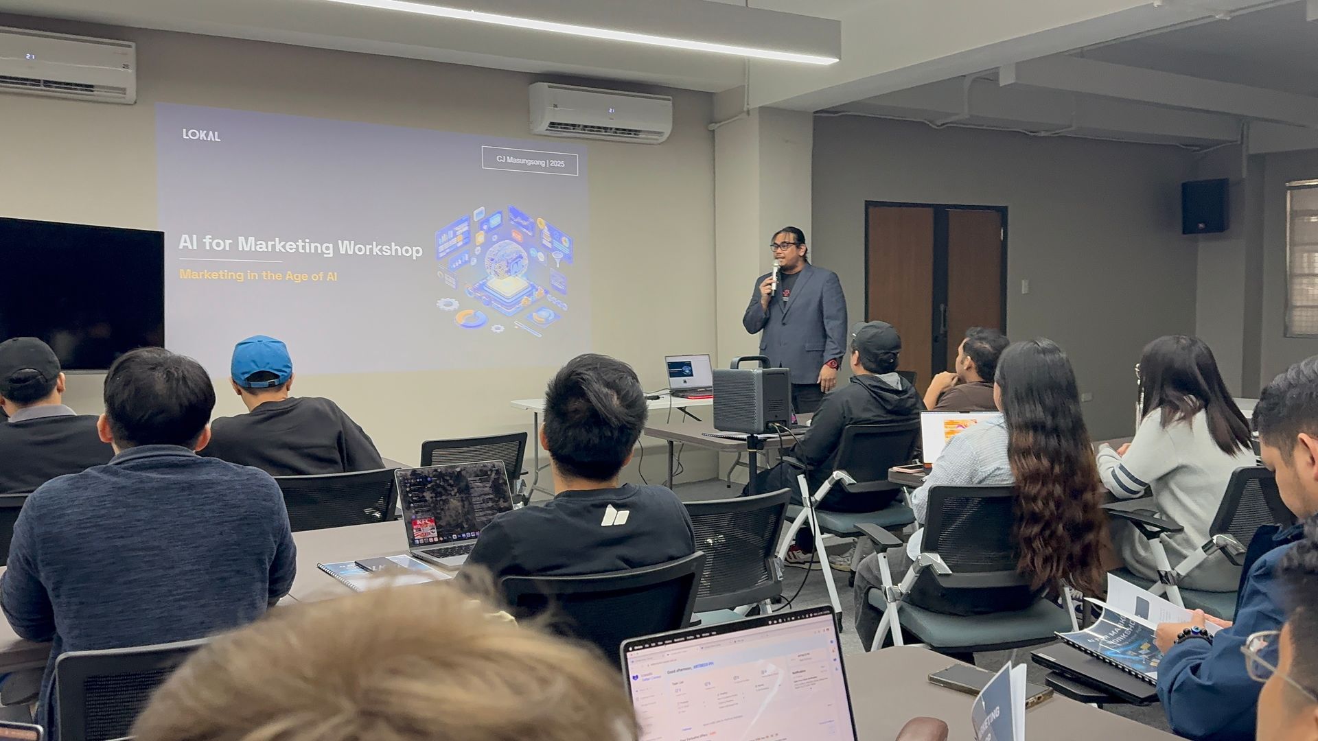 A LOKAL corporate AI training session in Metro Manila — a client team working through their own workflows.