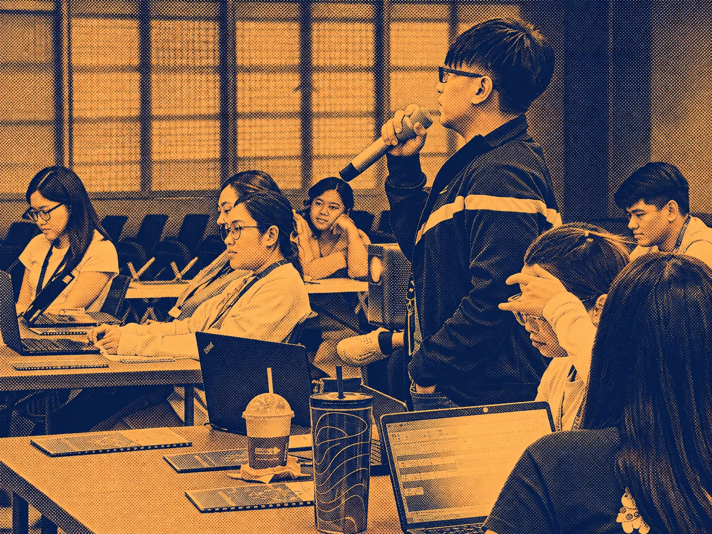 Orange and navy halftone treatment of a LOKAL workshop, with participants working at laptops
